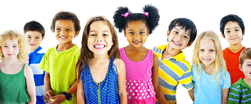 The image shows a group of children with diverse skin tones posing for a photo, with each child wearing different colored tops.